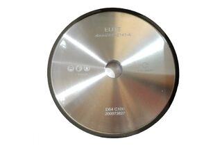 Diamond grinding wheel for grinding the top and face of the tooth on carbide tipped circular saw blades.