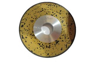 Diamond grinding wheel for sharpening the top and face of the tooth on carbide tipped circular saw blades.